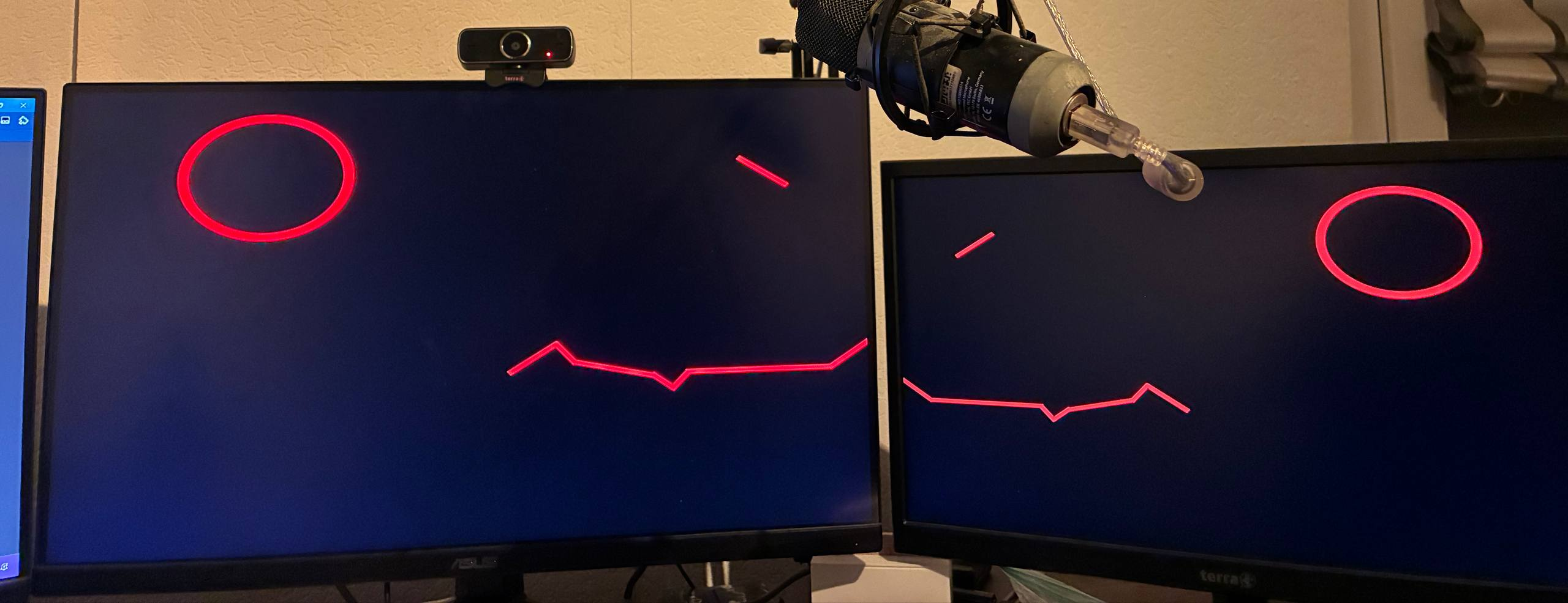 Two monitors displaying a soon to be Protogen Visor