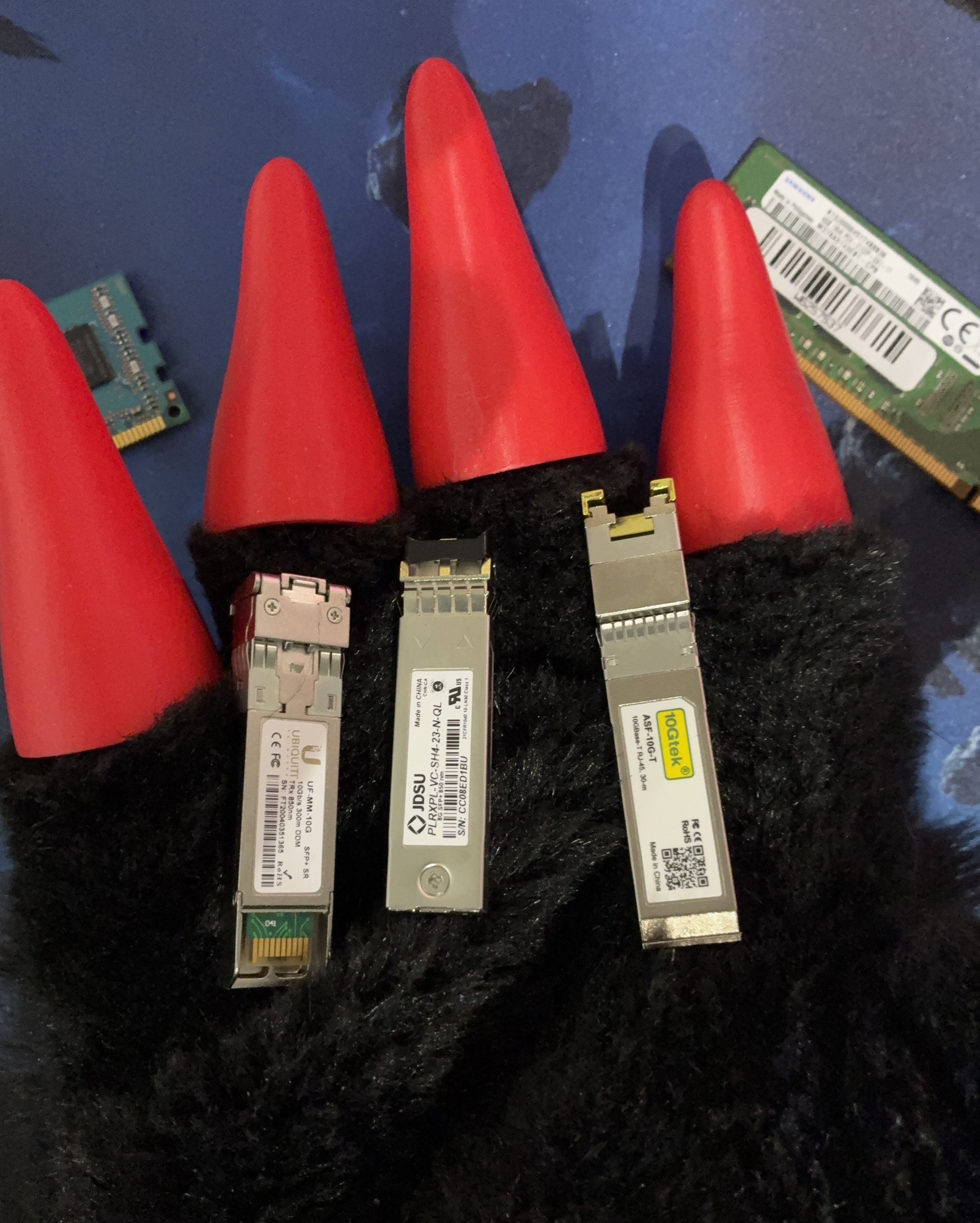 Protogen Paw holding 3 SFP Modules